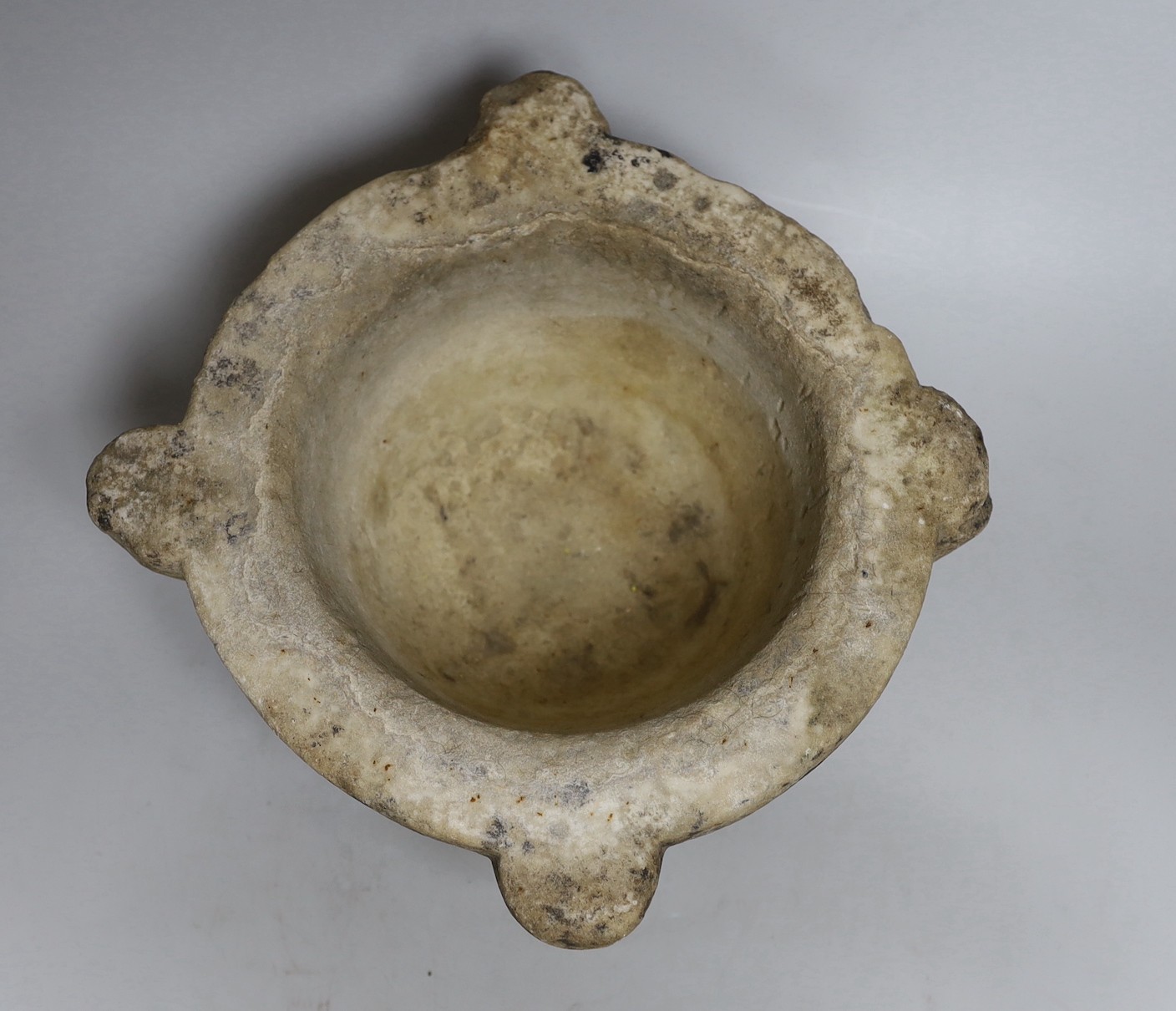 A 17th/18th century carved marble mortar, 31cm